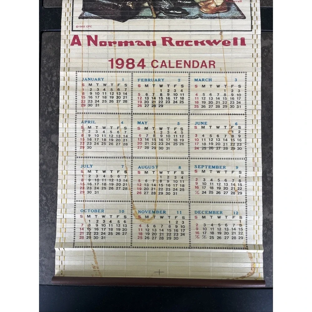 Vtg. Wooden 1984 Norman Rockwell Year-Long Roll-Up Calendar Wall Hanging
